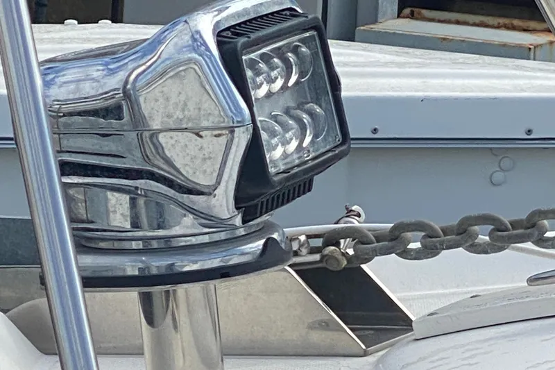 Slide: The Image of Close-up of a 2007 Sea Ray 300 Sundancer's anchor chain and spotlight. - 6