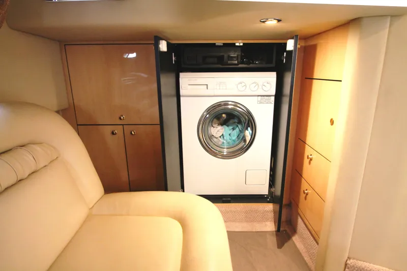 Slide: The Image of Mid Stateroom to Stbd with Washer/Dryer - 44