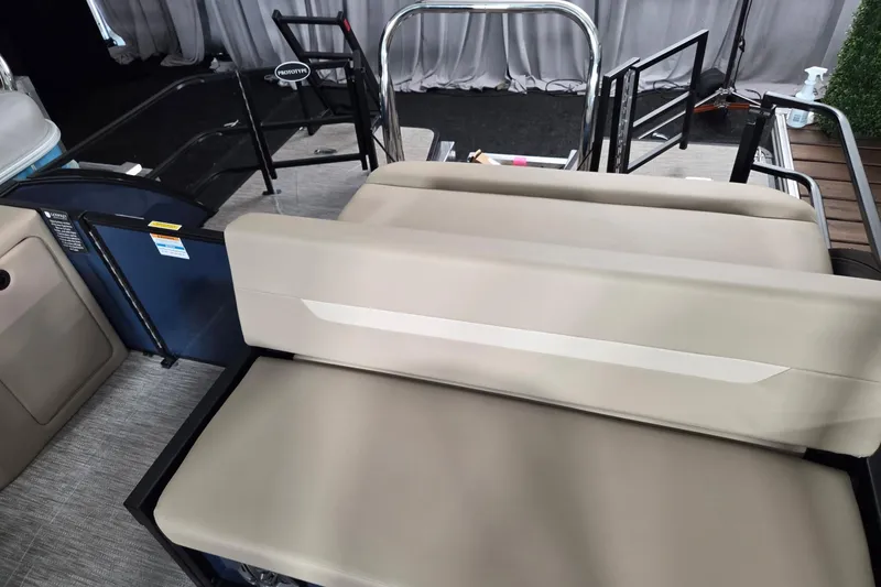 Slide: The Image of 2026 Godfrey Xperience 2286 SFLX boat interior with beige seating and modern design. - 10