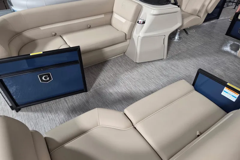 Slide: The Image of Interior of 2026 Godfrey Xperience 2286 SFLX pontoon boat with beige seating and helm. - 5
