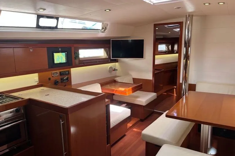 Slide: The Image of Luxurious interior of 2013 Beneteau Oceanis 45 yacht with modern amenities and elegant design. - 18