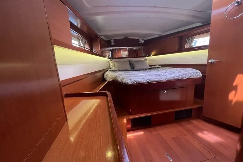 Slide: The Image of Luxurious cabin interior of 2013 Beneteau Oceanis 45 yacht with wooden finish. - 28