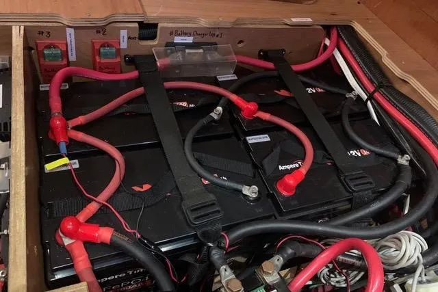 Slide: The Image of Battery compartment of a 2013 Beneteau Oceanis 45 sailboat with wiring and connections. - 36