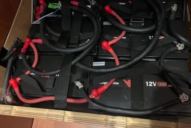 Slide: The Image of 12V batteries with cables on a Beneteau Oceanis 45, 2013 model. - 37