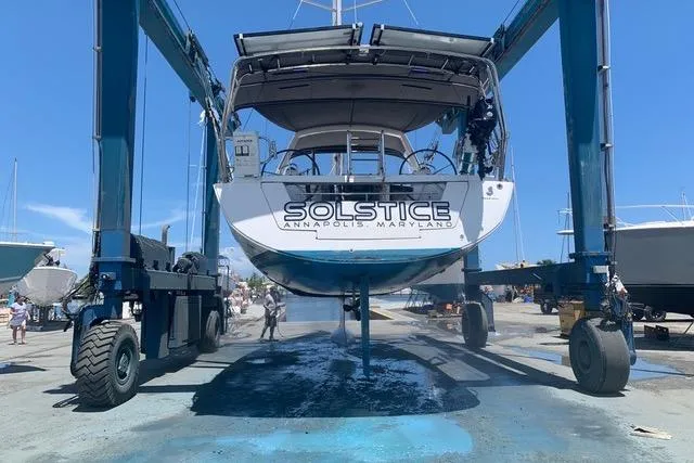 Slide: The Image of Beneteau Oceanis 45 sailboat, 2013 model, lifted in a marina, Annapolis, Maryland. - 38