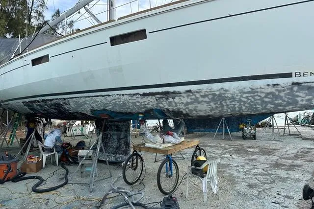Slide: The Image of 2013 Beneteau Oceanis 45 sailboat undergoing maintenance on dry dock. - 41