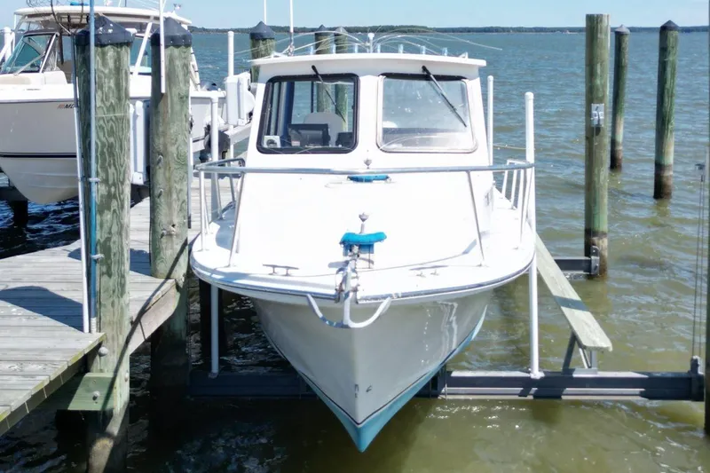 Slide: The Image of 2019 Judge 27 Chesapeake boat docked at marina, front view. - 4