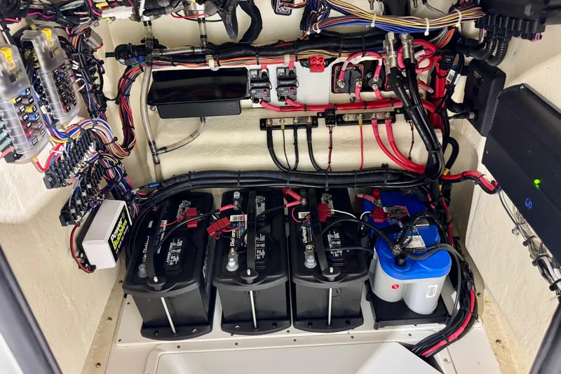 Slide: The Image of Electrical system of 2023 BlackJack 256 Coastal boat with batteries and wiring. - 11