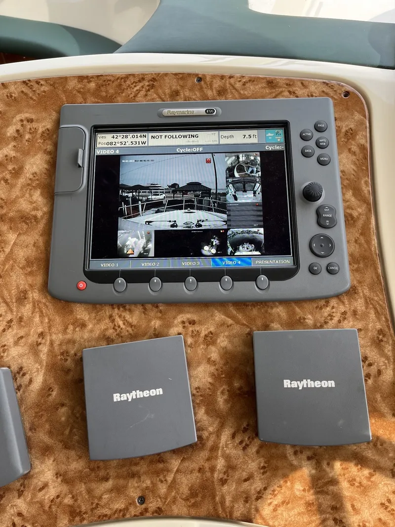 Slide: The Image of A Raytheon navigation system on a 2003 Azimut 46 MY displays a camera feed. - 17