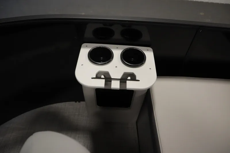 Slide: The Image of 2026 Lowe LF 194 boat interior with dual cup holders and sleek seating. - 14