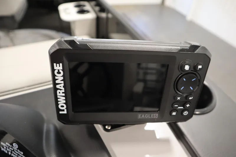 Slide: The Image of Fishfinder device on a 2026 Lowe LF 194 boat dashboard. - 24