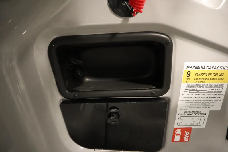 Slide: The Image of Interior compartment of 2026 Lowe LF 194 boat with capacity label. - 28