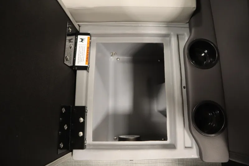 Slide: The Image of Interior compartment of 2026 Lowe LF 194 boat with cup holders and storage space. - 31