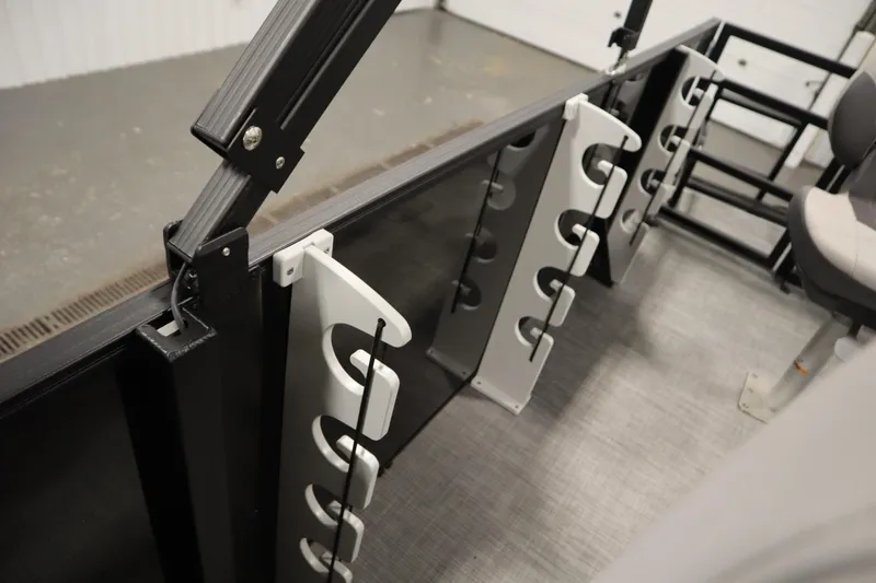 Slide: The Image of Interior of 2026 Lowe LF 194 boat featuring rod holders and seating. - 35