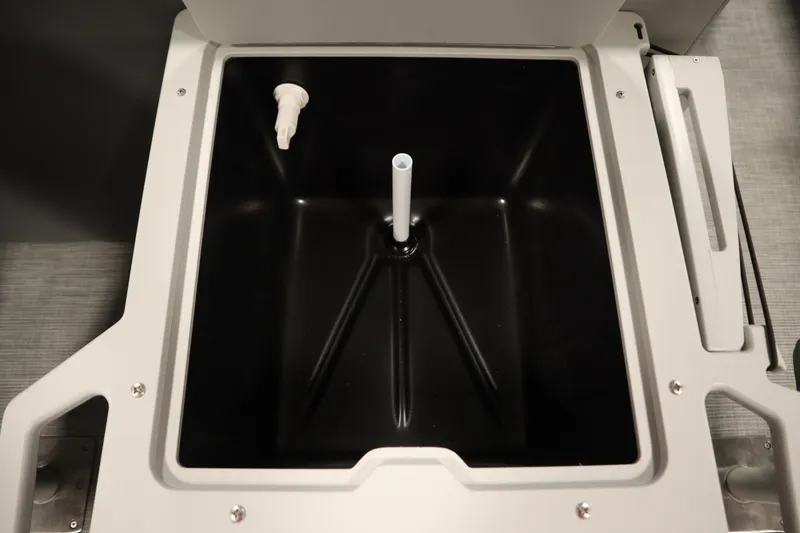 Slide: The Image of Lowe LF 194 livewell interior, 2026 model, featuring a black basin and white nozzle. - 39