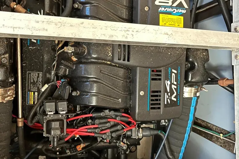 Slide: The Image of Engine compartment of a 1998 Carver 355 Aft Cabin with MerCruiser 7.4 MPI engine. - 26