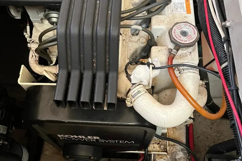 Slide: The Image of Engine compartment of 1998 Carver 355 Aft Cabin with Kohler power system. - 27