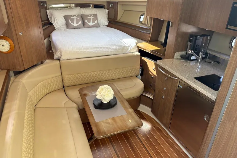 Slide: The Image of Luxurious interior of 2011 Chaparral 330 Signature yacht with cozy seating and modern amenities. - 19
