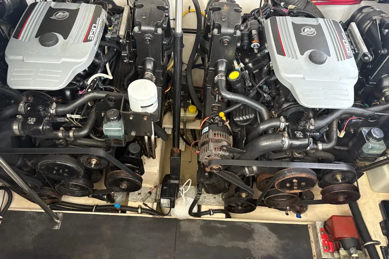Slide: The Image of Twin MerCruiser engines in a 2011 Chaparral 330 Signature boat engine compartment. - 47