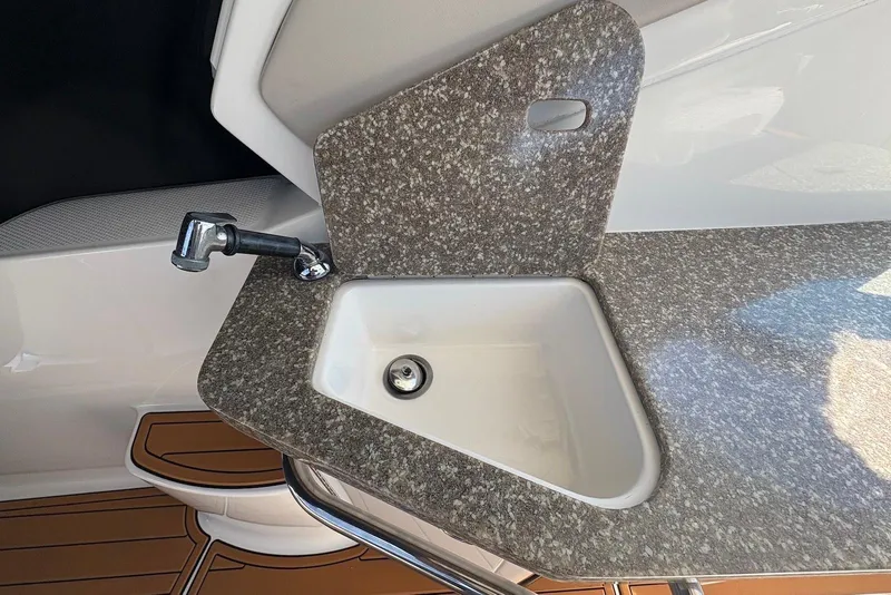 Slide: The Image of Granite countertop with sink in 2011 Chaparral 330 Signature boat. - 7