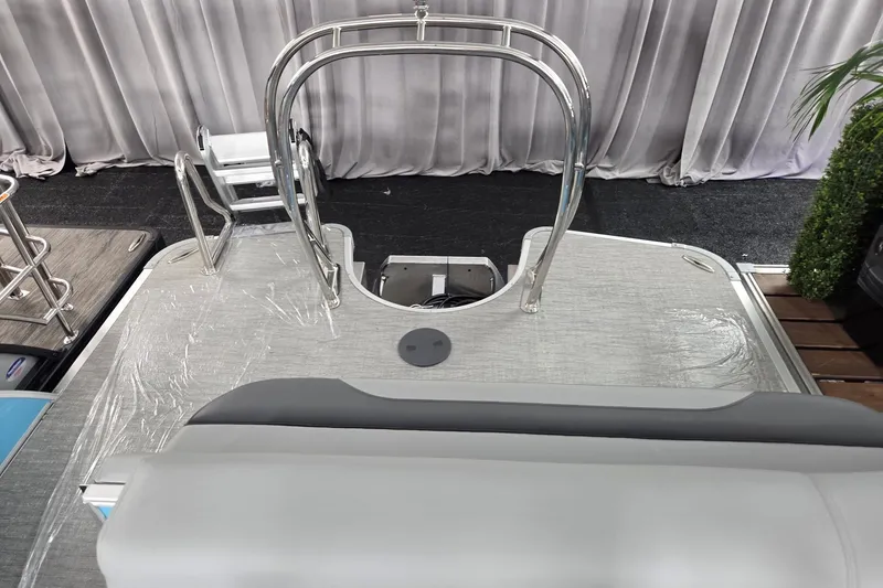 Slide: The Image of 2026 Godfrey Monaco 235 QSB boat deck with sleek design and modern features. - 9