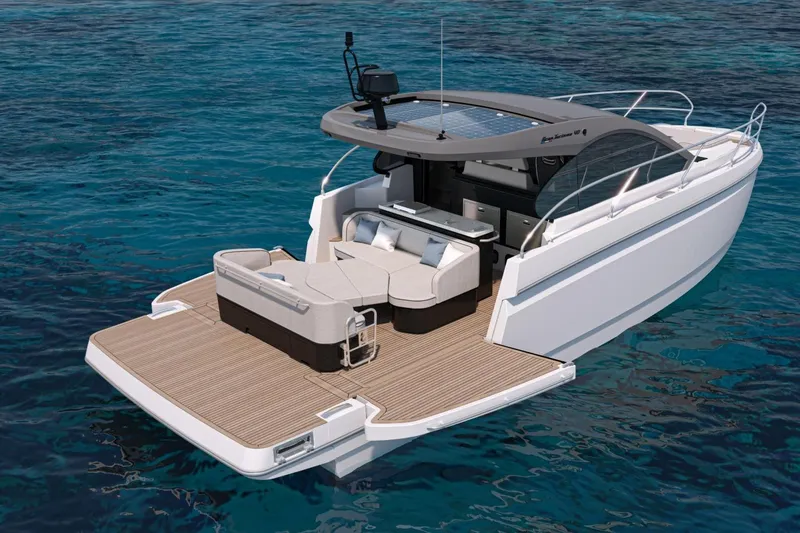 Slide: The Image of 2026 Beneteau Gran Turismo 40 yacht on clear blue water, featuring sleek design and spacious deck. - 27