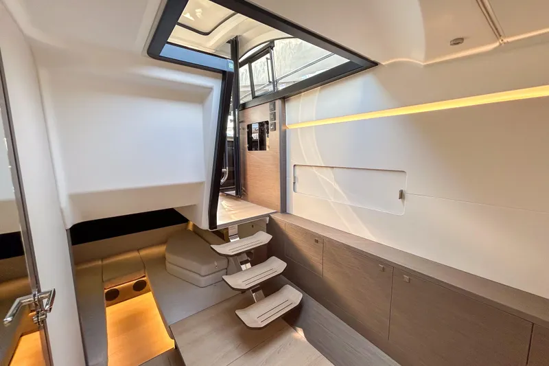 Slide: The Image of Interior of 2026 Beneteau Gran Turismo 40 yacht, featuring modern design and elegant lighting. - 5