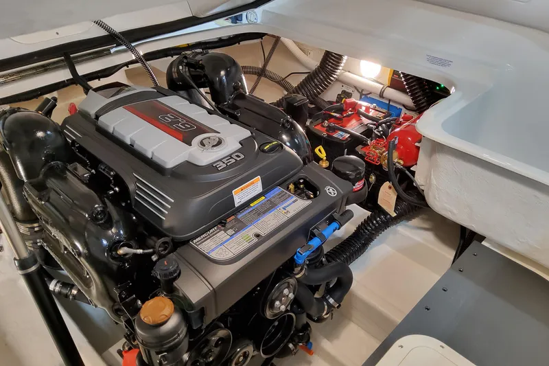 Slide: The Image of Engine compartment of 2026 Formula 240 Bowrider, featuring a powerful 350 horsepower engine. - 14