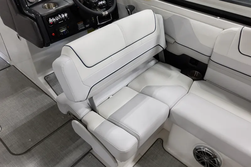 Slide: The Image of 2026 Formula 240 Bowrider interior with luxurious white seating and modern dashboard. - 20