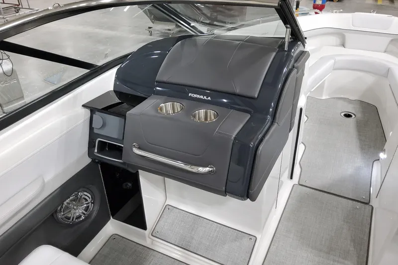 Slide: The Image of 2026 Formula 240 Bowrider interior with sleek design and cup holders. - 23