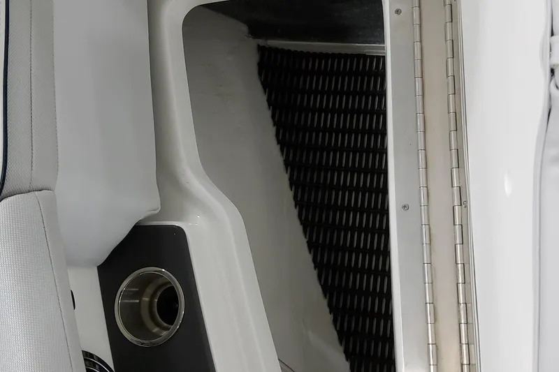 Slide: The Image of Interior detail of 2026 Formula 240 Bowrider boat, featuring seating and cup holder. - 36