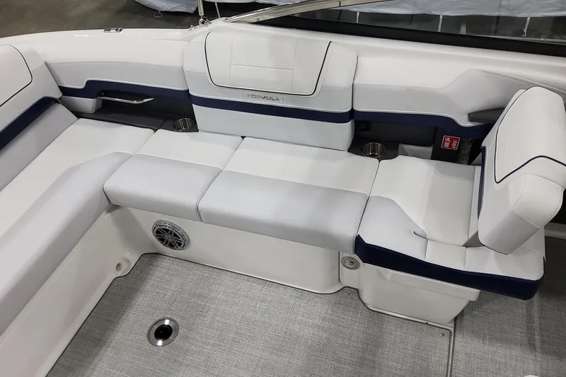 Slide: The Image of 2026 Formula 270 Bowrider interior with white seating and modern design. - 12