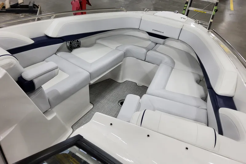 Slide: The Image of 2026 Formula 270 Bowrider interior with luxurious white seating and modern design. - 17