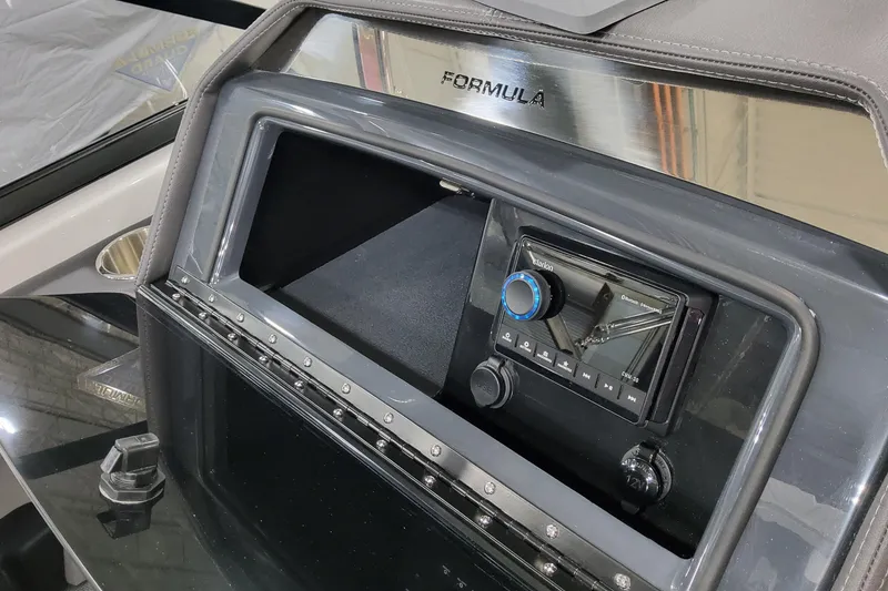 Slide: The Image of 2026 Formula 270 Bowrider dashboard with modern audio system and sleek design. - 22