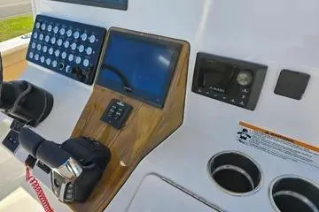 Slide: The Image of Control panel of 2026 Caymas 291 boat with modern navigation and control systems. - 5