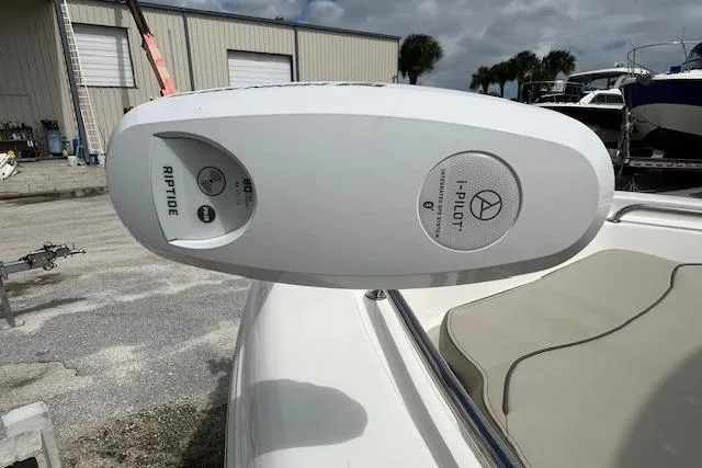 Slide: The Image of 2023 Key West 189 FS boat with Riptide i-Pilot trolling motor, docked outdoors. - 10