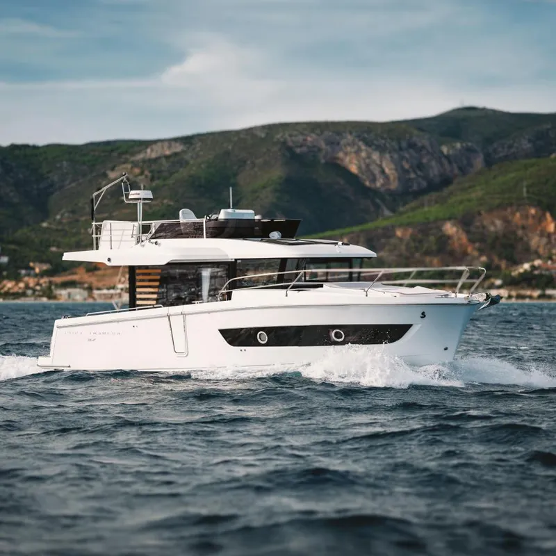 The Image of 2026 Beneteau Swift Trawler 37 cruising on scenic coastal waters. - 0