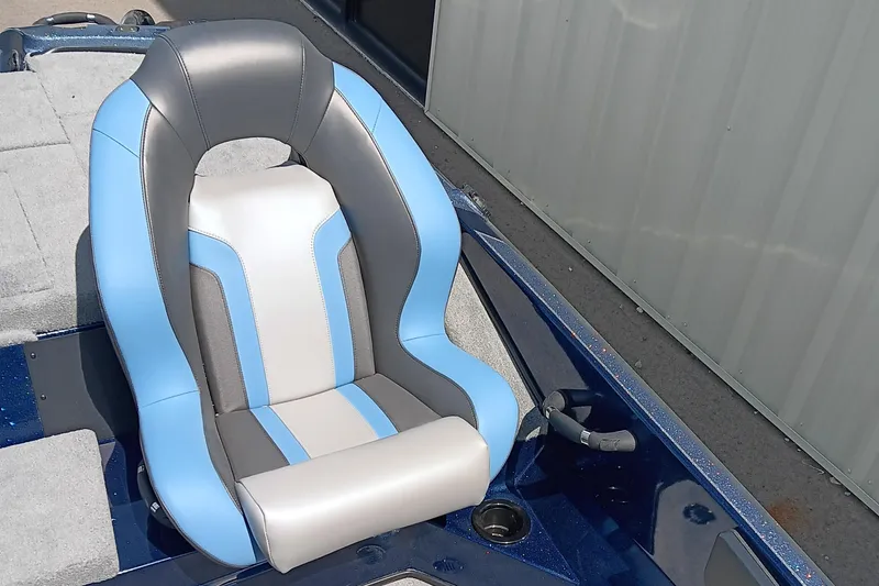 Slide: The Image of 2026 Nitro Z18 boat seat with blue and gray accents, featuring ergonomic design. - 11