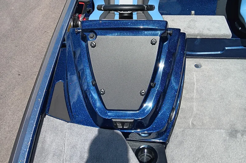 Slide: The Image of 2026 Nitro Z18 boat interior with blue metallic finish and gray carpet. - 9