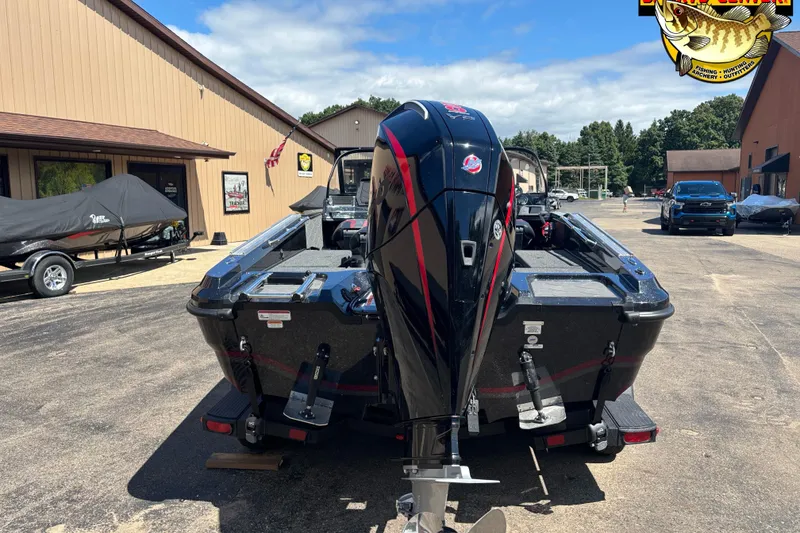 Slide: The Image of 2026 Nitro ZV20 Pro boat with powerful outboard motor in dealership lot. - 4