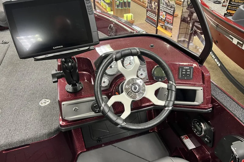 Slide: The Image of Steering console of 2026 Nitro ZV20 Pro boat with Garmin display and controls. - 4