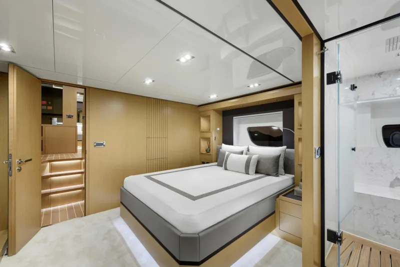 Slide: The Image of Luxurious interior of 2025 Vicem 65 Classic yacht, featuring elegant bedroom design. - 9