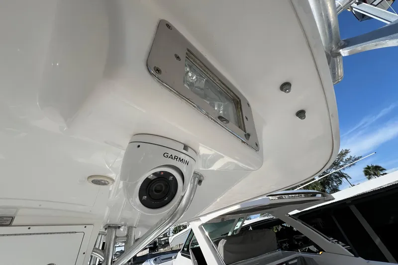 Slide: The Image of 2012 Regulator 24 Forward Seating boat with Garmin camera and light fixture. - 39