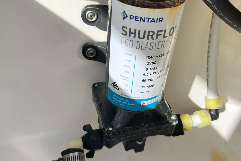 Slide: The Image of Pentair Shurflo Pro Blaster pump in 2012 Regulator 24 Forward Seating boat. - 47