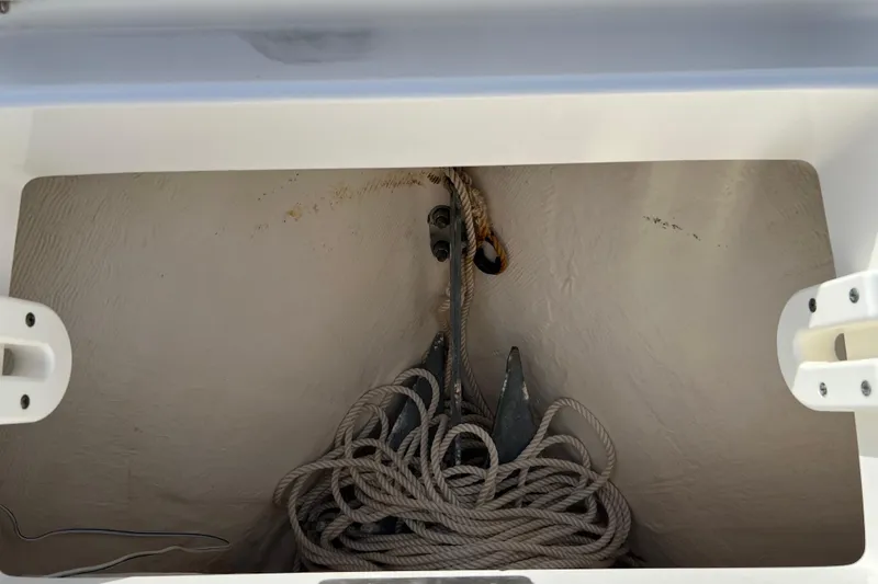 Slide: The Image of Anchor storage compartment on a 2012 Regulator 24 Forward Seating boat. - 49