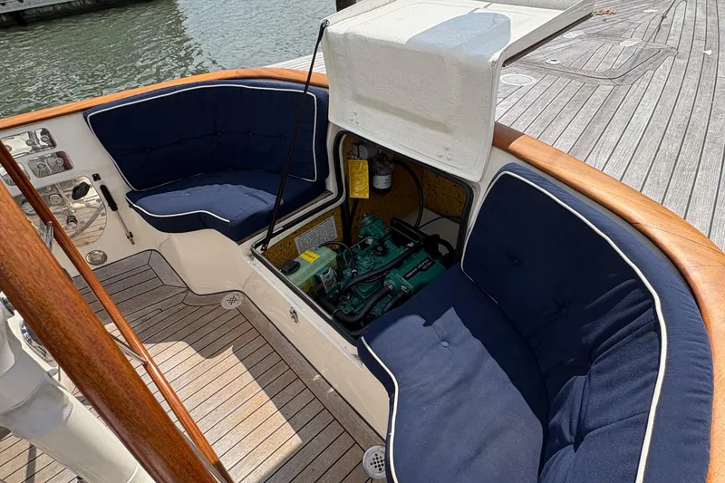 Slide: The Image of Interior of 2017 Leonardo Eagle 44 yacht with open engine compartment and blue cushioned seating. - 15
