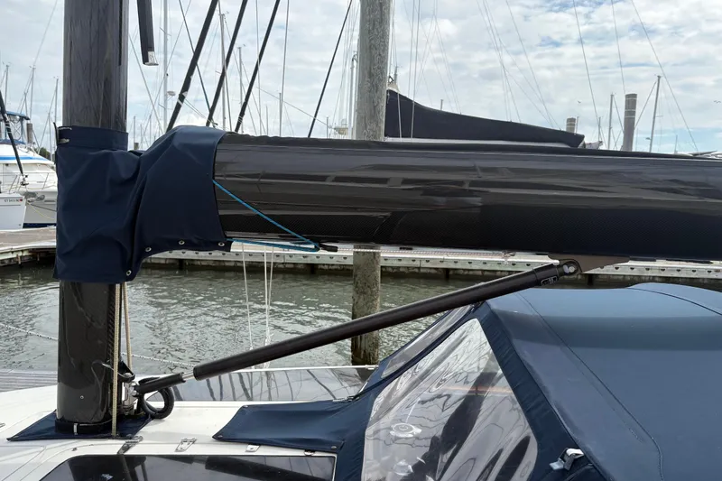 Slide: The Image of Sailboat mast and boom of 2017 Leonardo Eagle 44 at marina dock. - 3