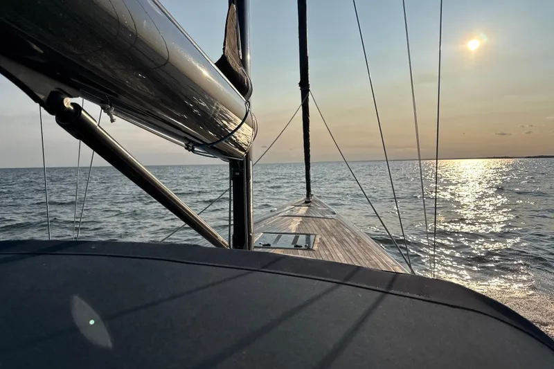 Slide: The Image of Sailing on Leonardo Eagle 44 yacht at sunset, 2017 model, serene ocean view. - 30