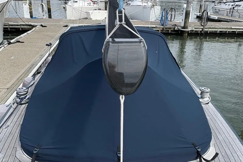 Slide: The Image of Leonardo Eagle 44 sailboat, 2017 model, docked with a blue cover on deck. - 4