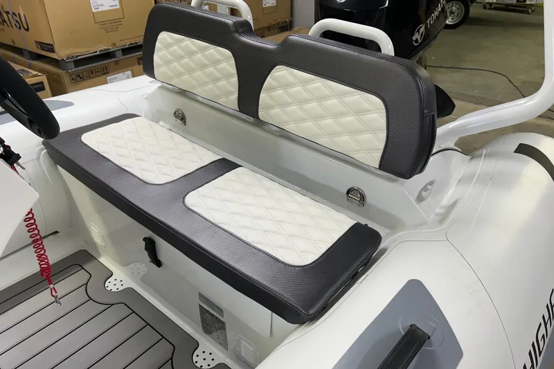 Slide: The Image of 2025 Highfield Sport 390 boat interior with quilted seating and modern design. - 10
